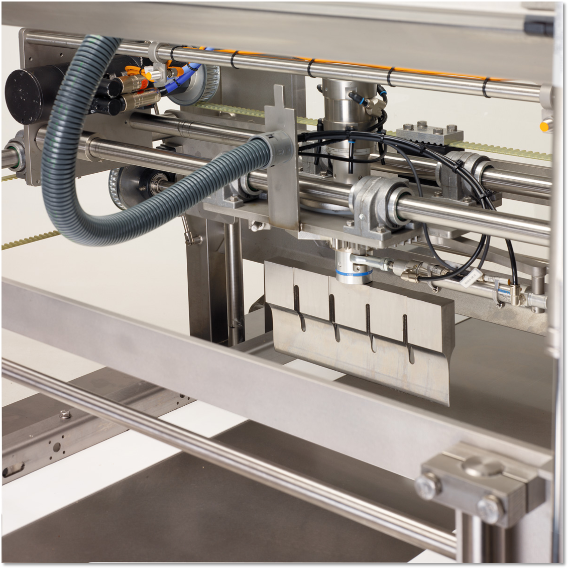 Ultrasonic knife cutting machine during industrial operation